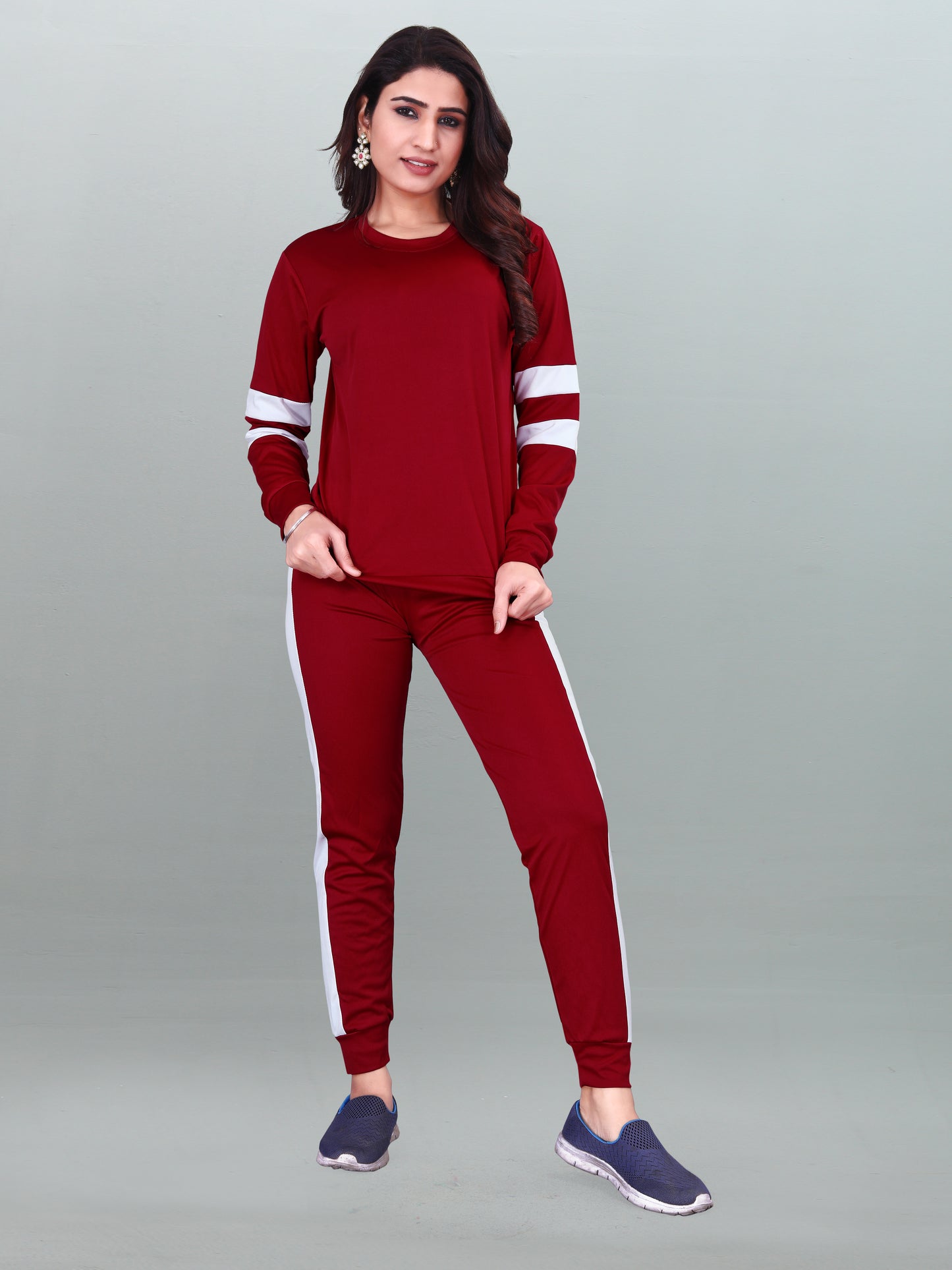 DB Women's Maroon Tracksuit: Effortless Elegance for Every Activity!