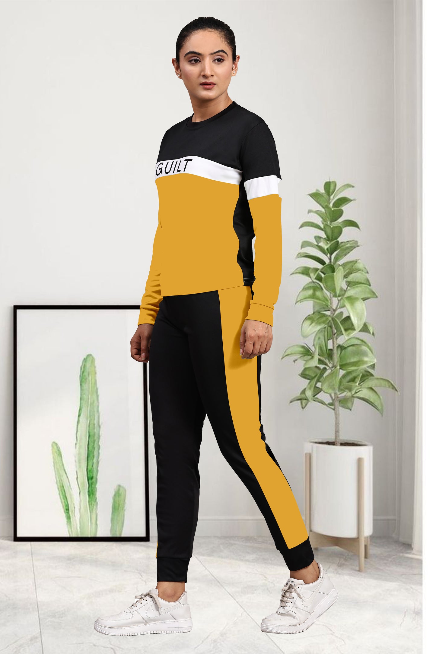 Radiant in Yellow: Guilt Women's Tracksuit – Embrace Vibrant Style and Comfort!