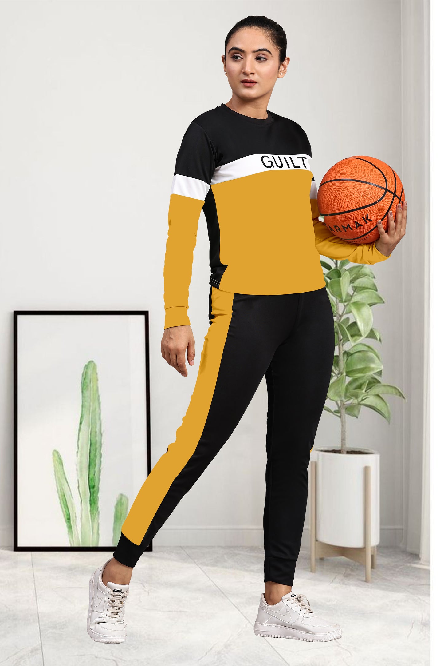 Radiant in Yellow: Guilt Women's Tracksuit – Embrace Vibrant Style and Comfort!